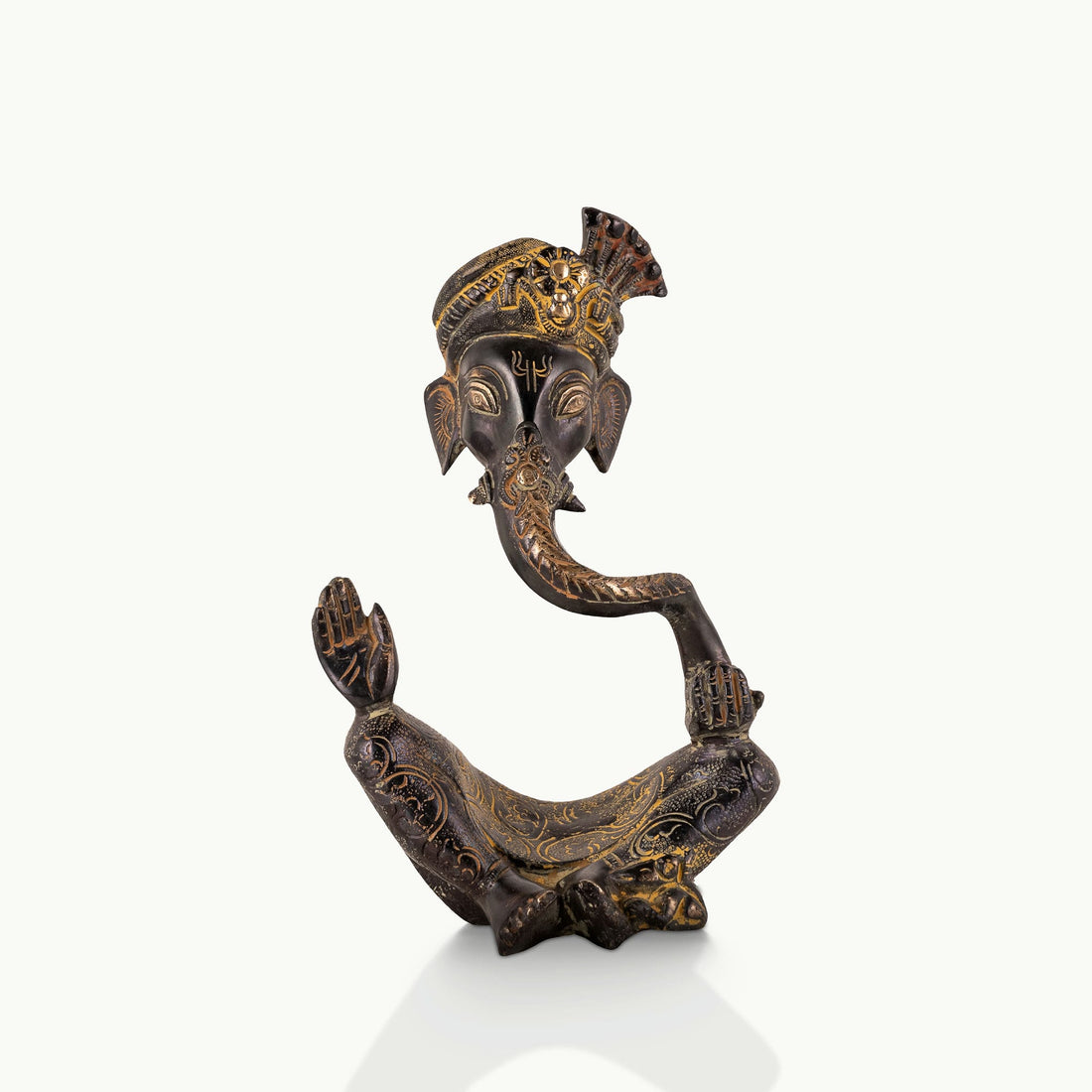 Stylized Black Brass Ganesha shaped in a sweeping continuous loop for a floating black console.