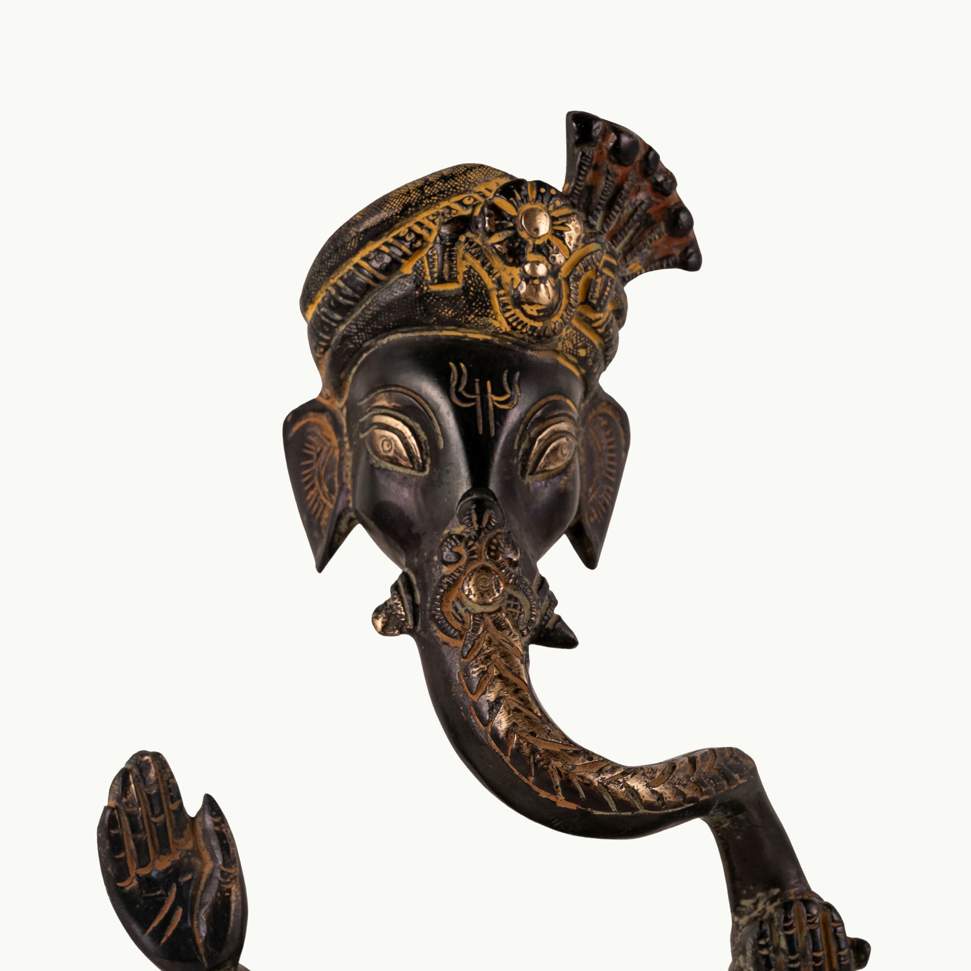 Stylized Black Brass Ganesha shaped in a sweeping continuous loop for a floating black console.