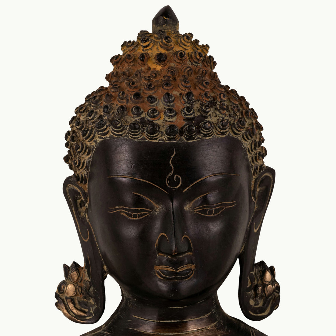 Dark Oxidized Brass Buddha Head featuring a rusted ushnisha for a minimalist console.
