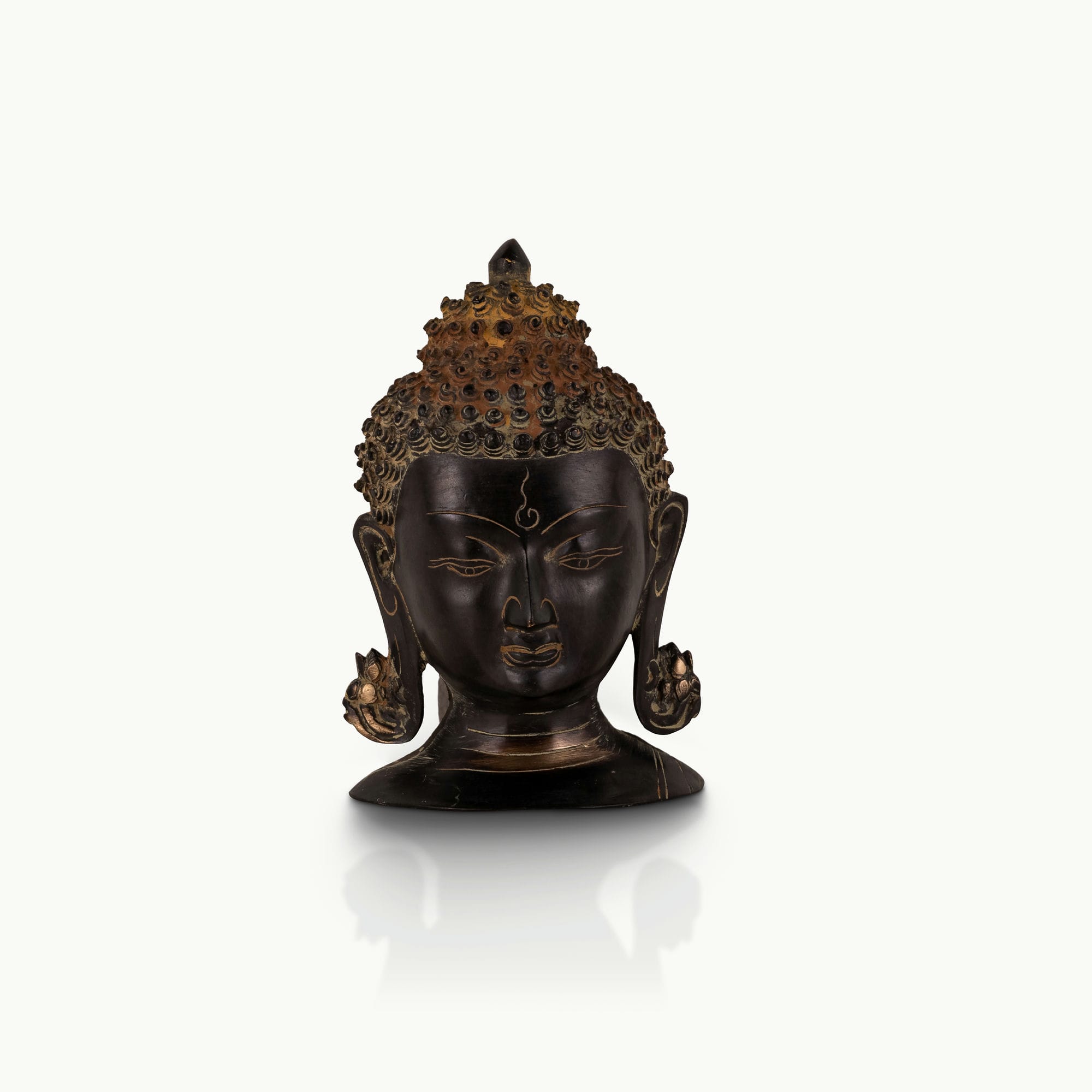 Dark Oxidized Brass Buddha Head featuring a rusted ushnisha for a minimalist console.