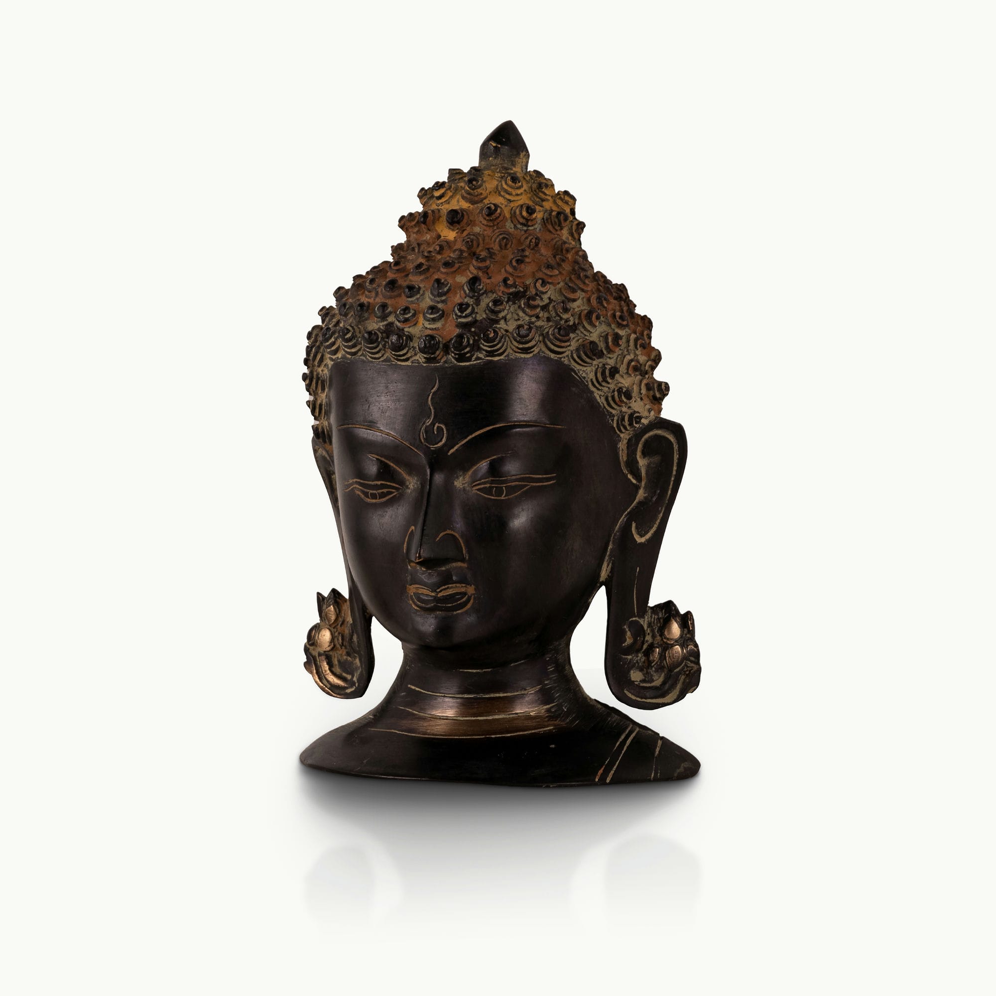 Dark Oxidized Brass Buddha Head featuring a rusted ushnisha for a minimalist console.