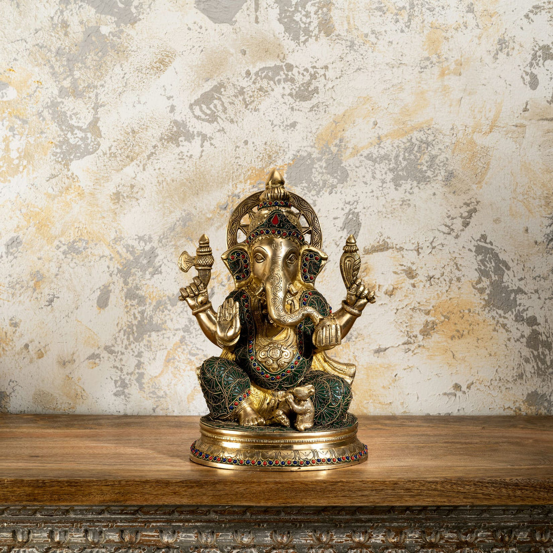 Large brass Ganpati idol sitting gracefully with a loyal mouse vahana, perfect for a traditional home altar or Diwali gift.