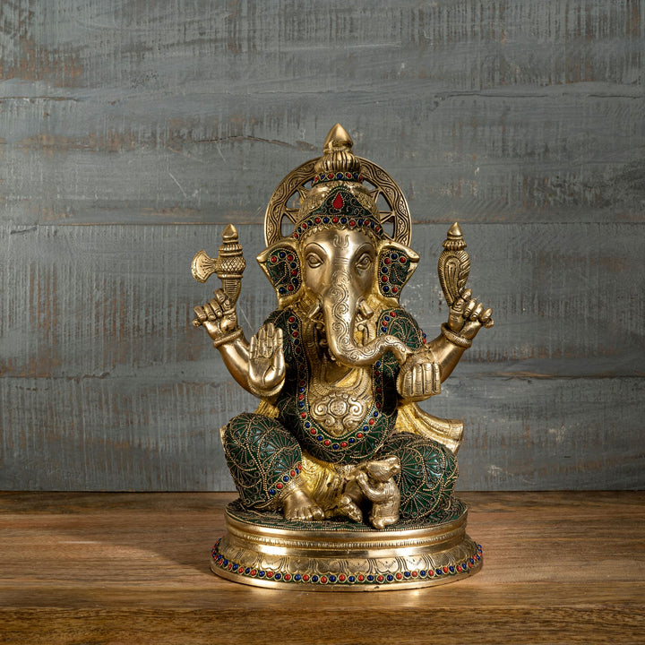 Large brass Ganpati idol sitting gracefully with a loyal mouse vahana, perfect for a traditional home altar or Diwali gift.