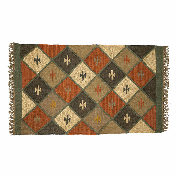 Jodhpur wool jute rug in a hallway, featuring a dynamic checkerboard of large rust and charcoal diamonds. 