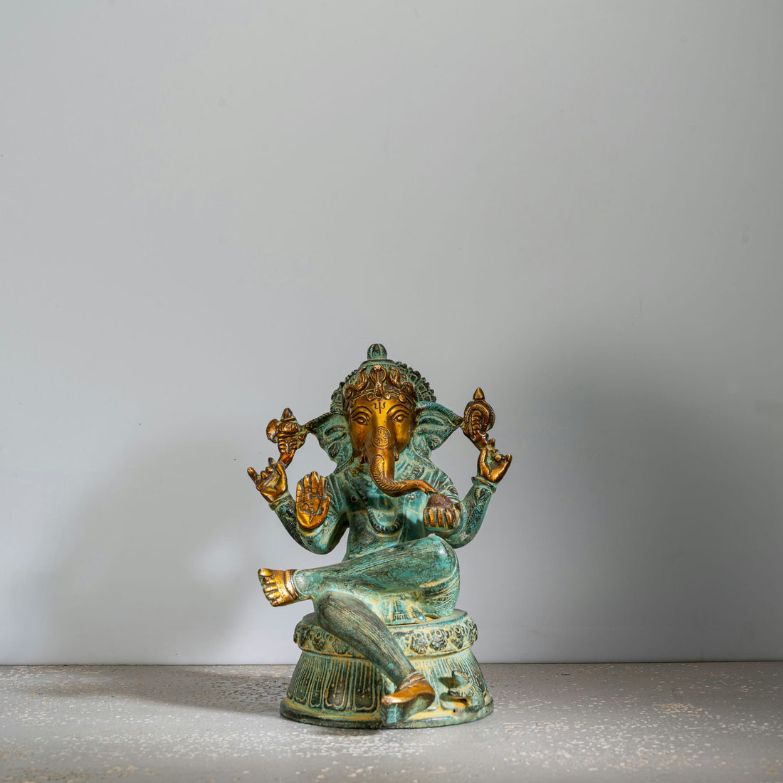 Verdigris Brass Seated Ganesha Statue: The Emerald Sovereign
