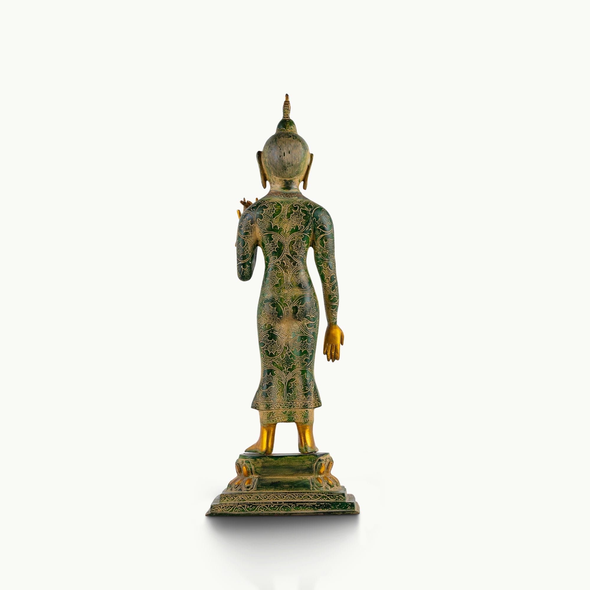Tall standing dual-tone brass Buddha statue featuring a green engraved robe and polished gold face.