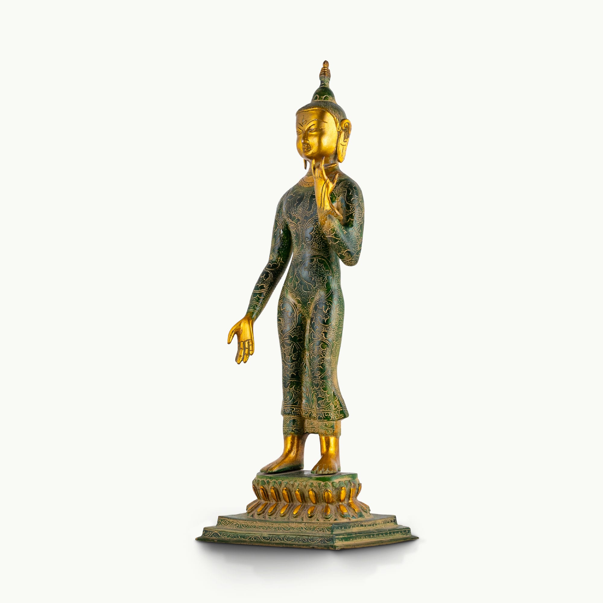Tall standing dual-tone brass Buddha statue featuring a green engraved robe and polished gold face.