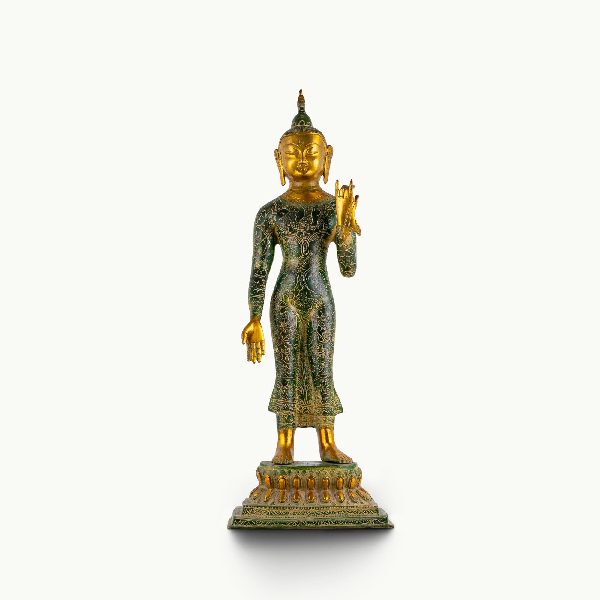 Tall standing dual-tone brass Buddha statue featuring a green engraved robe and polished gold face.