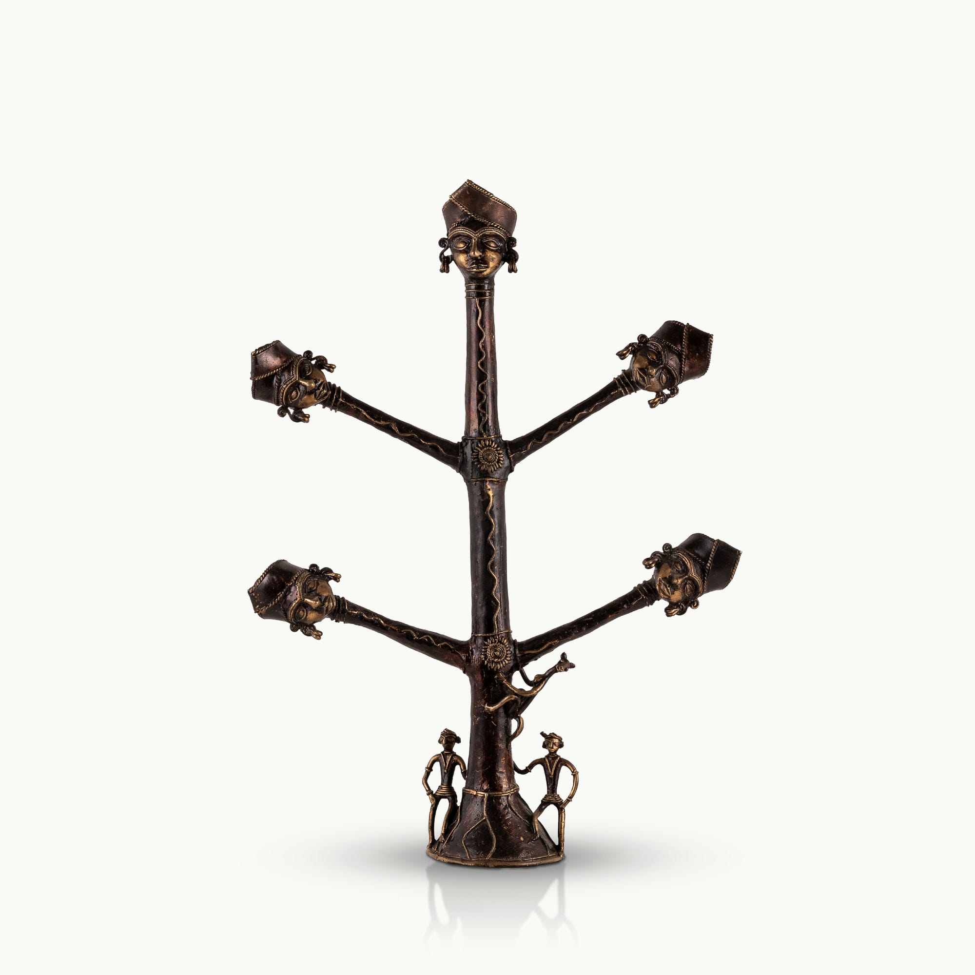 Dhokra Brass Tree Sculpture extending its ancestral branches on an entryway credenza