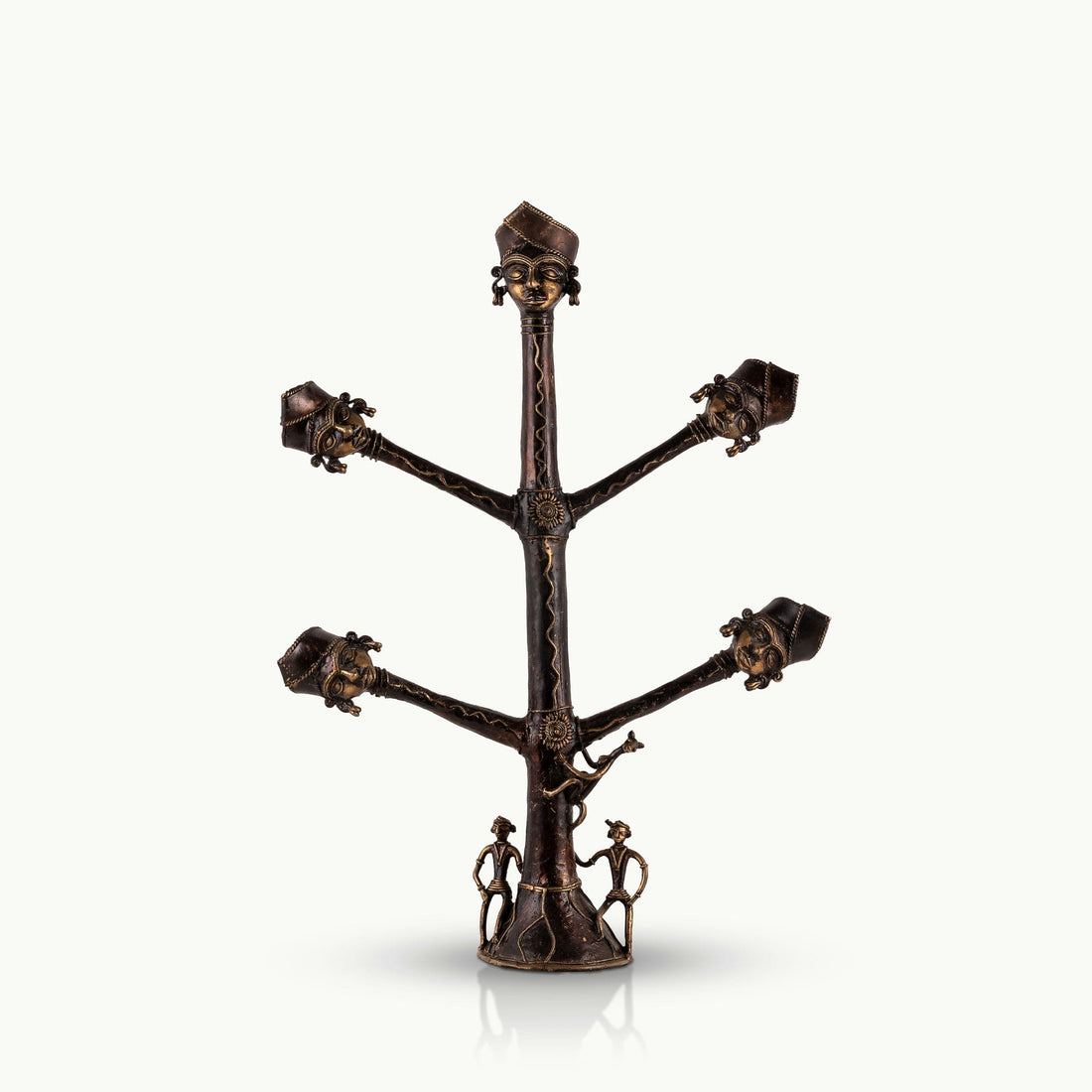 Dhokra Brass Tree Sculpture extending its ancestral branches on an entryway credenza