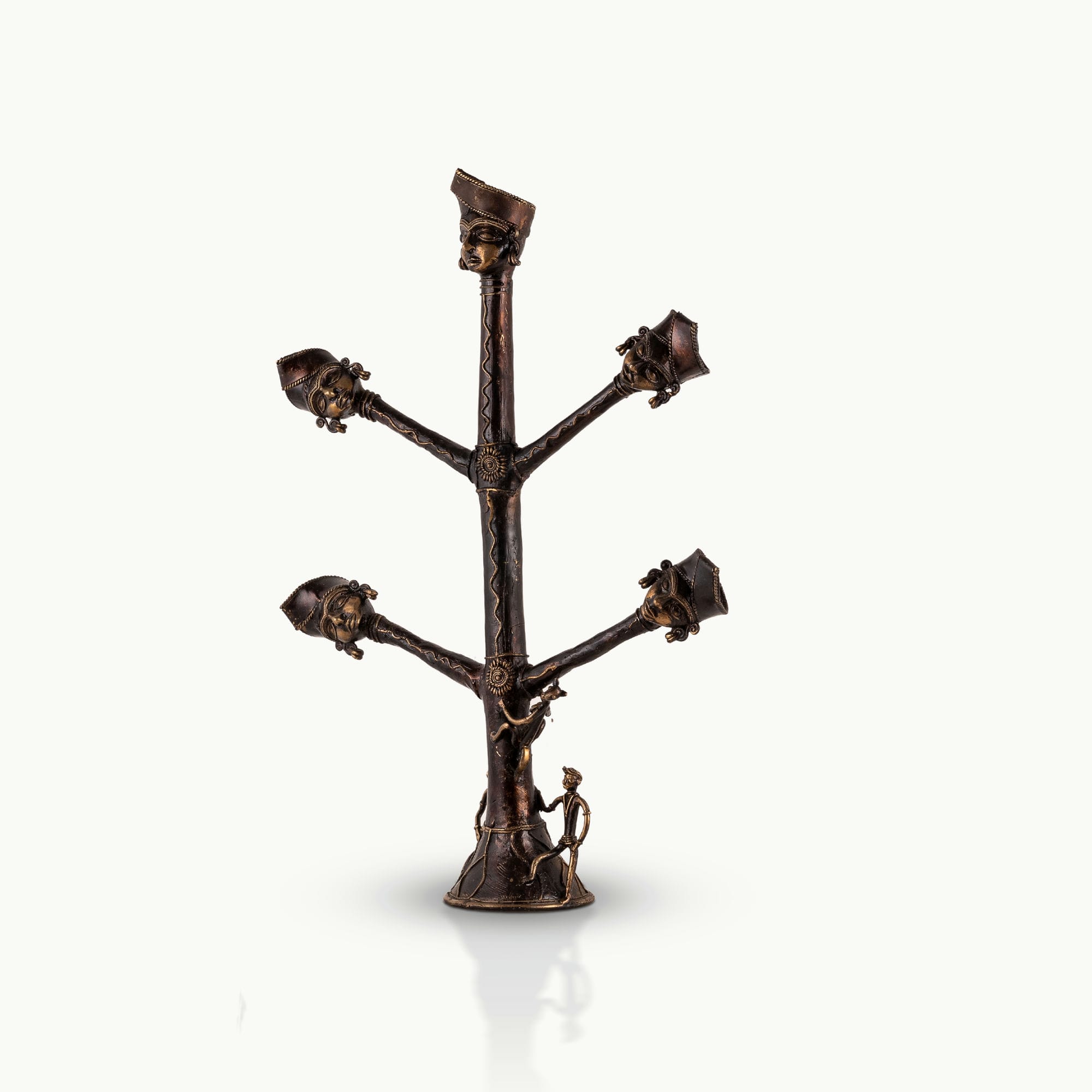 Dhokra Brass Tree Sculpture extending its ancestral branches on an entryway credenza