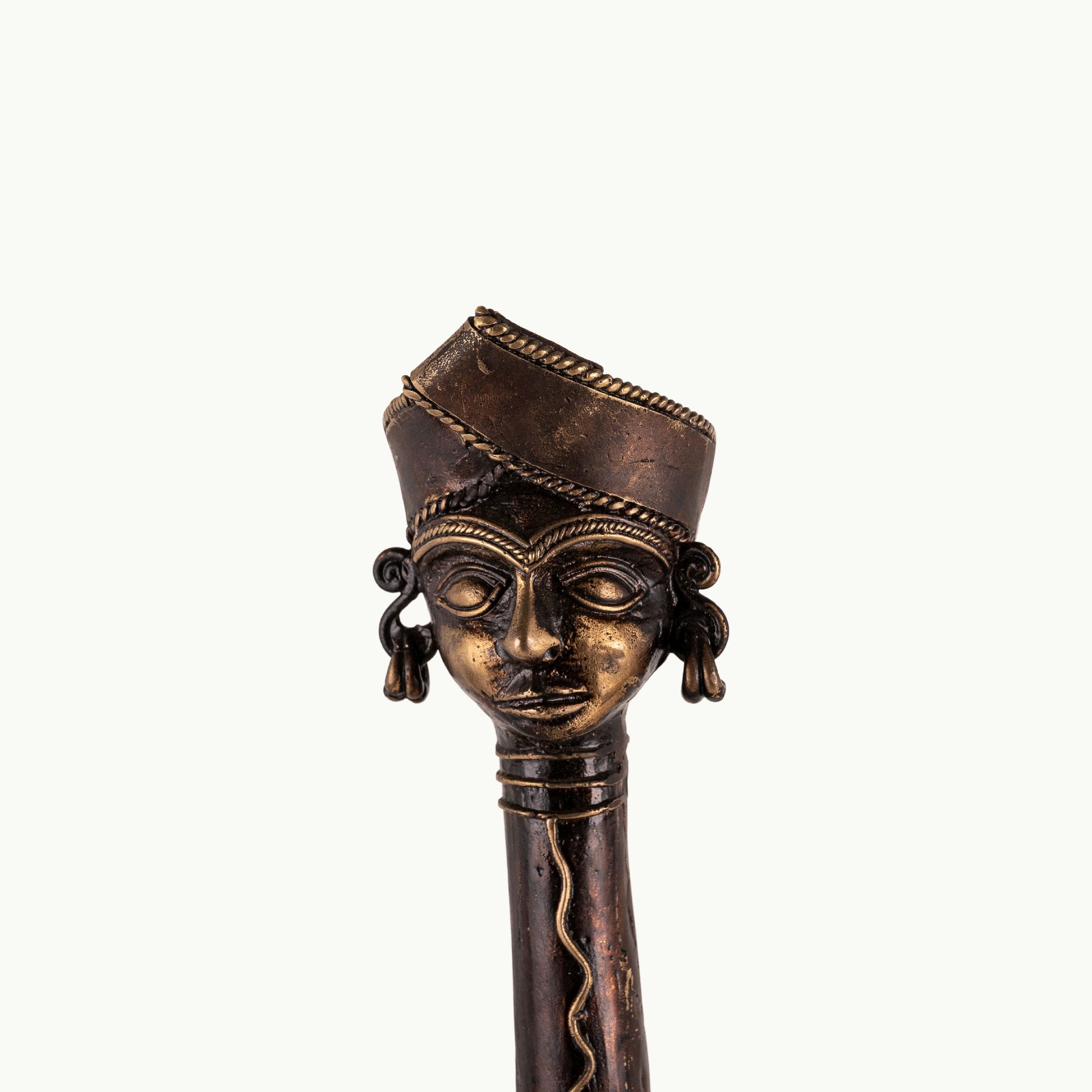 Dhokra Brass Tree Sculpture extending its ancestral branches on an entryway credenza