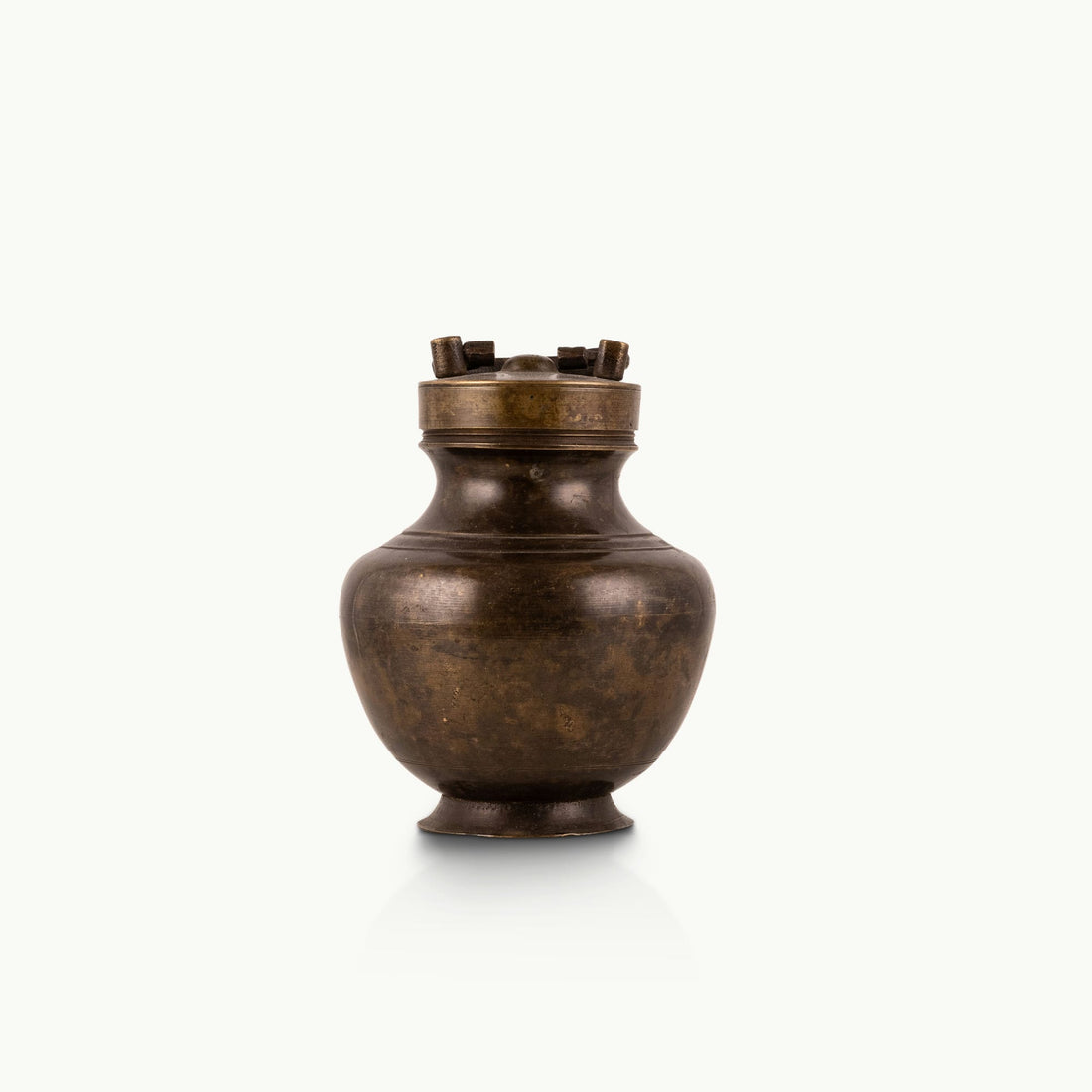 Antique Brass Surma Container with a tiny finger loop for a mirrored dressing tray.