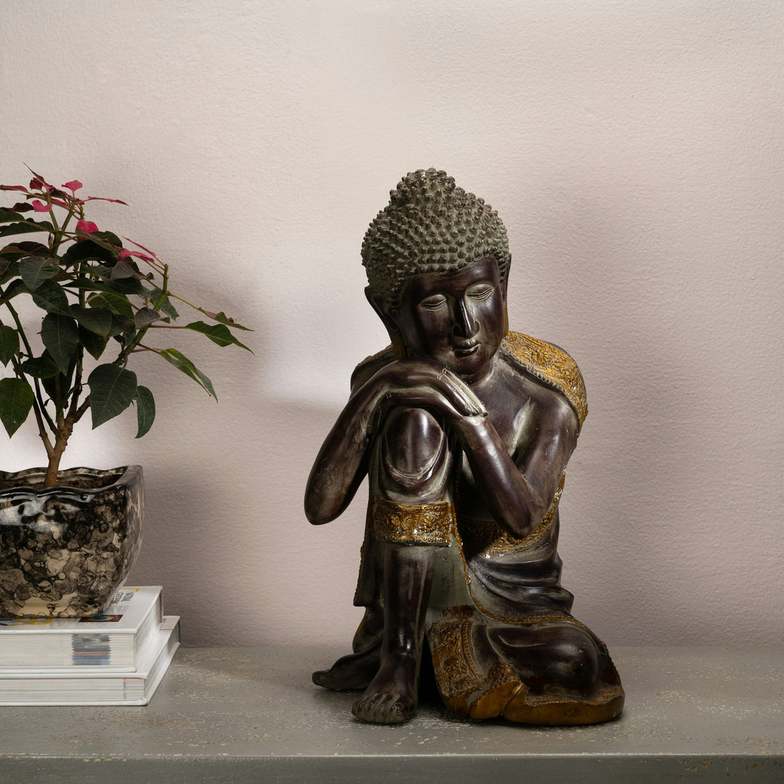 Dark Brass Resting Buddha Statue: The Shadowed Reflection