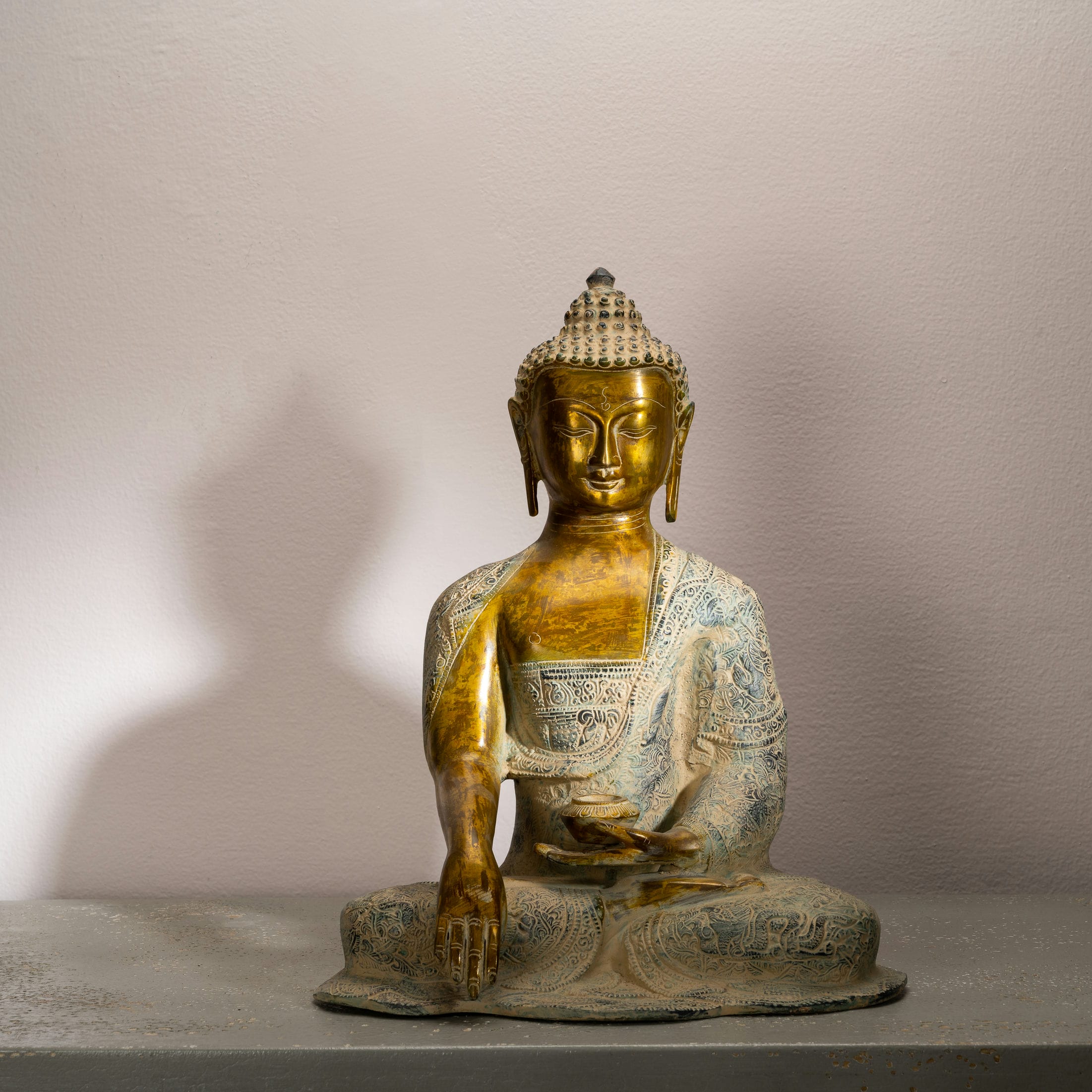 Patterned Brass Bhumisparsha Buddha Statue: The Floral Witness