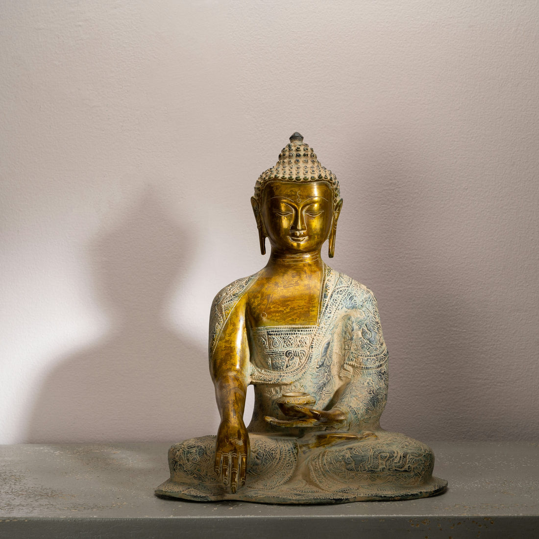 Patterned Brass Bhumisparsha Buddha Statue: The Floral Witness