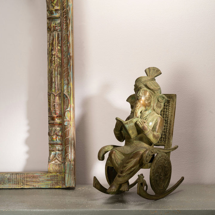 Antique Brass Rocking Chair Ganesha Idol: The Sovereign Scholar