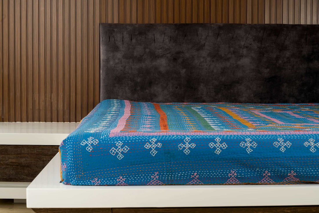 Kantha quilt with geometric stripe pattern