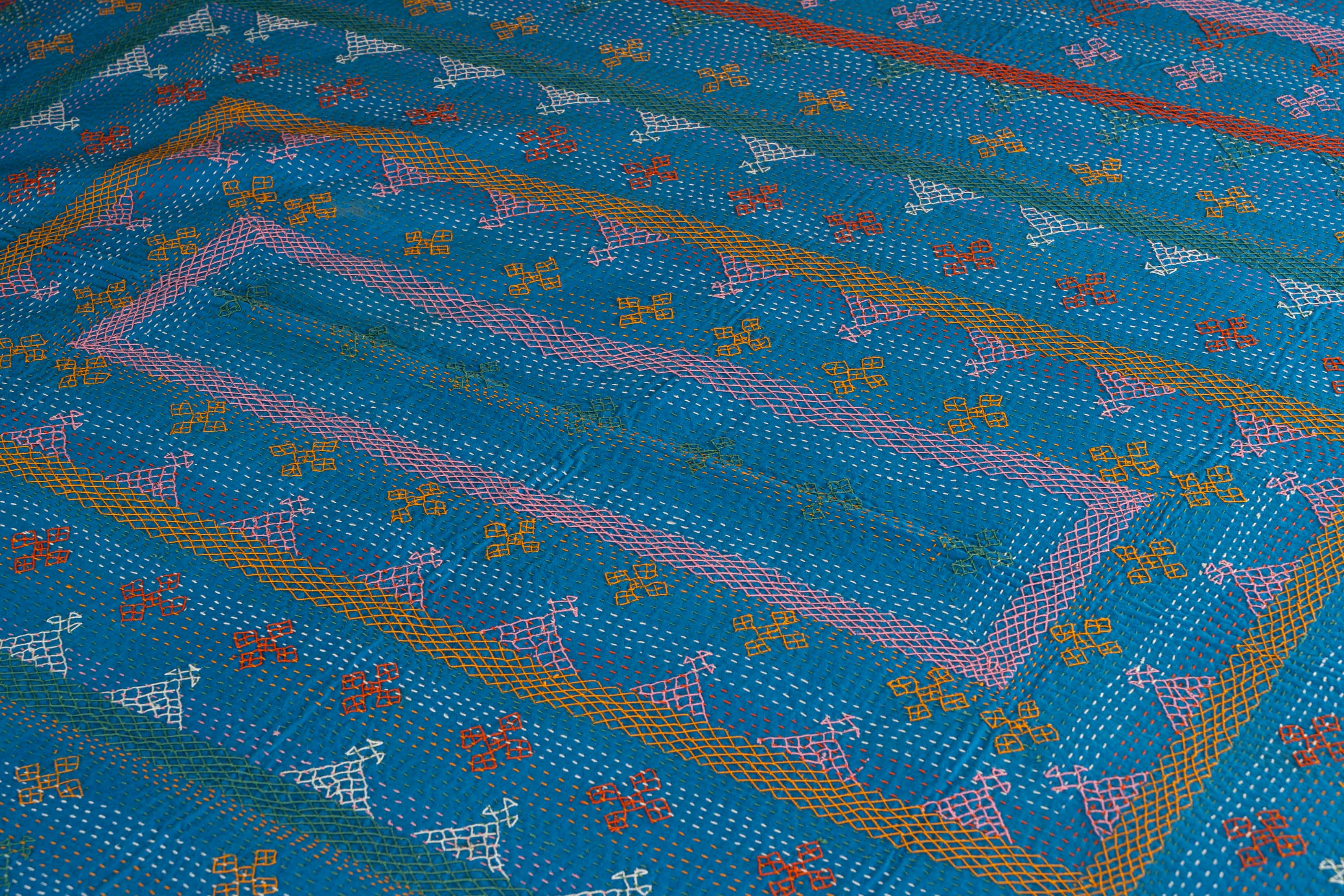 Kantha quilt with geometric stripe pattern