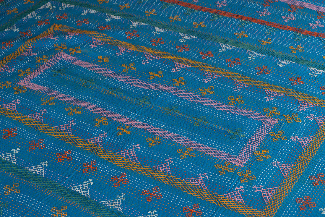 Kantha quilt with geometric stripe pattern