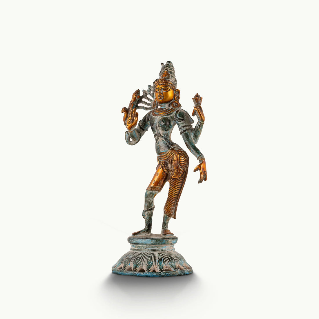 Dual-tone Shiva Shakti metal idol with a polished gold-tone face and teal patina for a foyer console or housewarming gift.