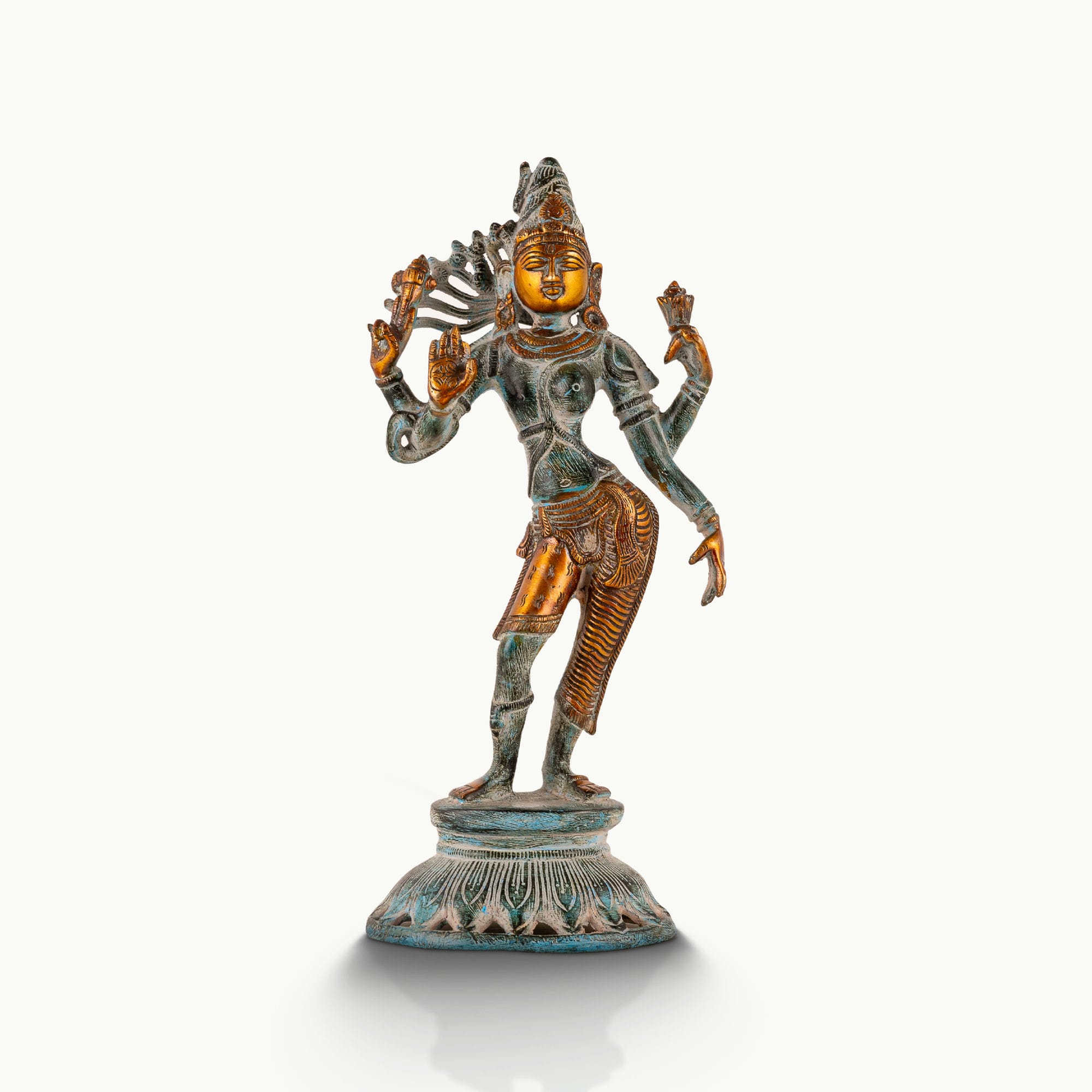 Verdigris Brass Ardhanarishvara Statue displaying cosmic union on a foyer console. 