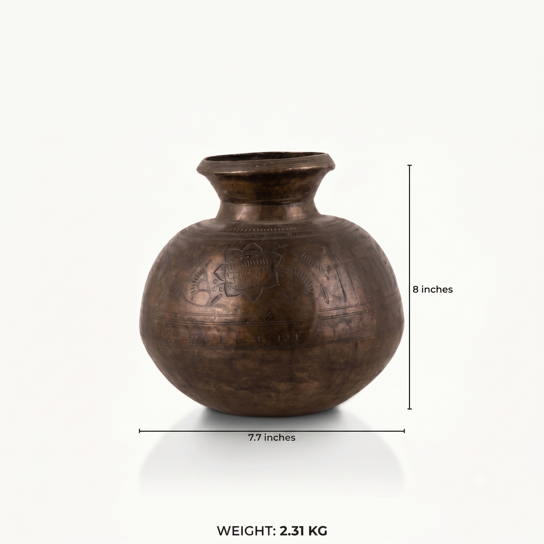 Engraved Antique Brass Water Pot chased for a rustic wooden console.
