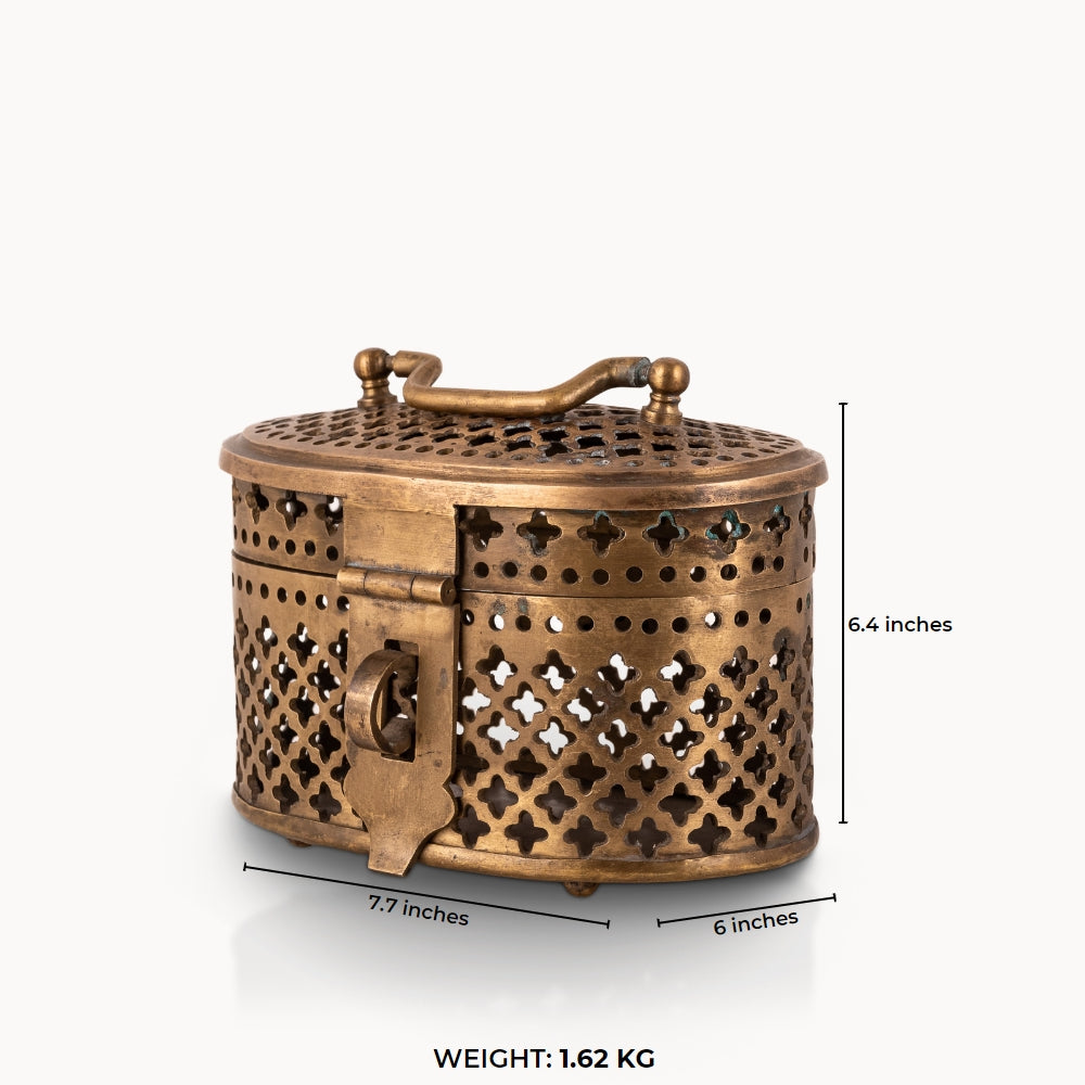 Antique Brass Pierced Oval Box featuring a delicate quatrefoil lattice for a walnut dresser.