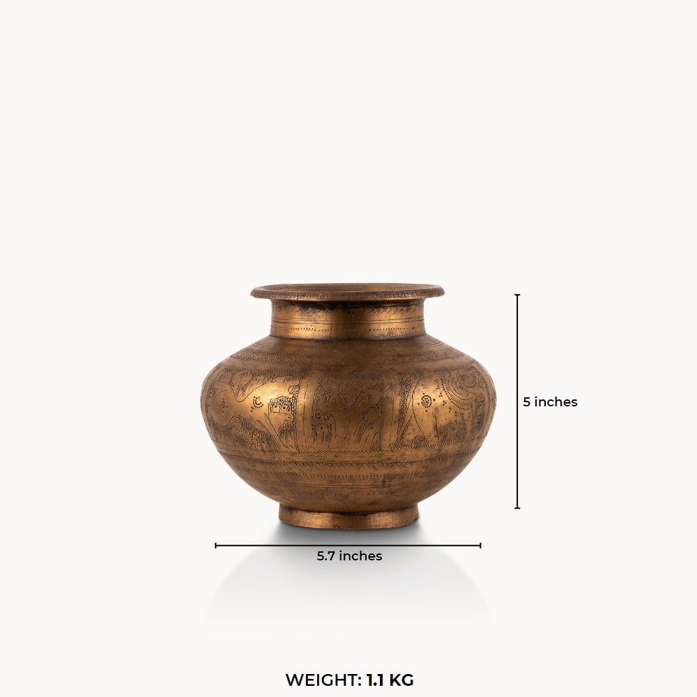 Engraved Brass Elephant Water Pot wrapped in a wildlife frieze for a walnut executive desk.