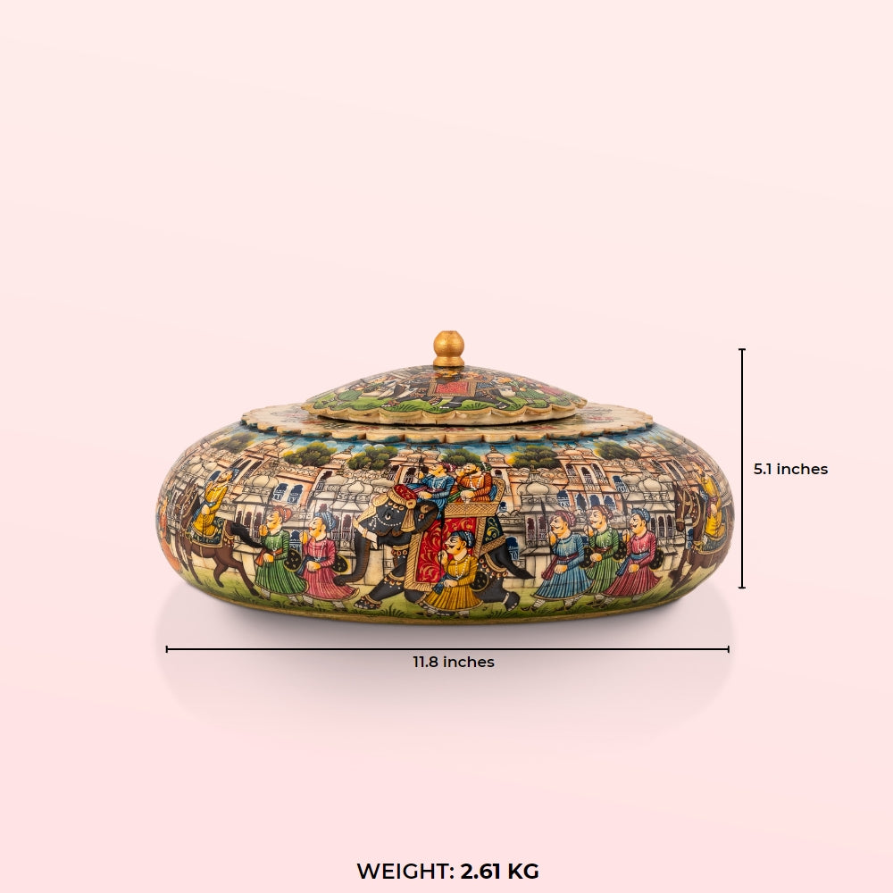 Painted domed camel bone box featuring a vivid royal procession scene against a sky-blue background.