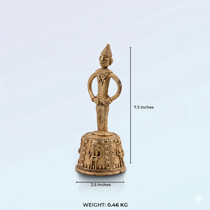 Dhokra brass figure bell featuring a stylized tribal man atop a wire-bound ceremonial dome.
