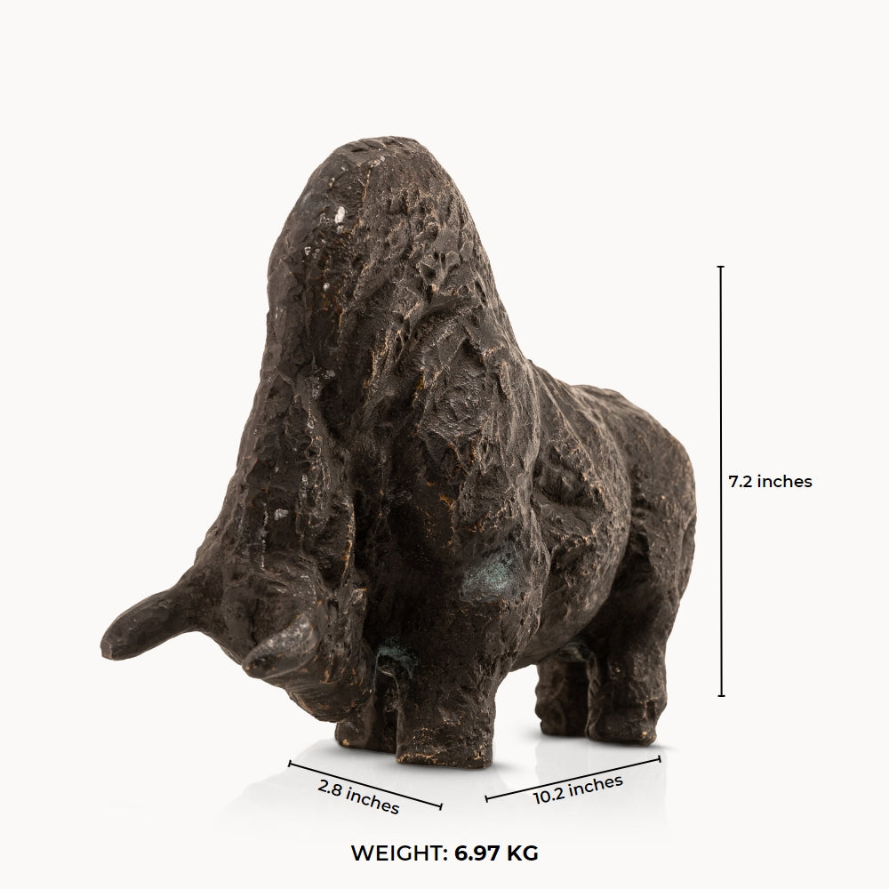 Abstract heavy metal animal figurine highlighting deep cratered surface patterns for a minimalist concrete 