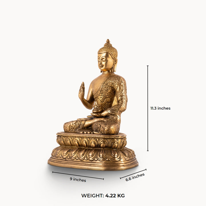 Antique polished brass buddha in abhaya mudra on tiered lotus base