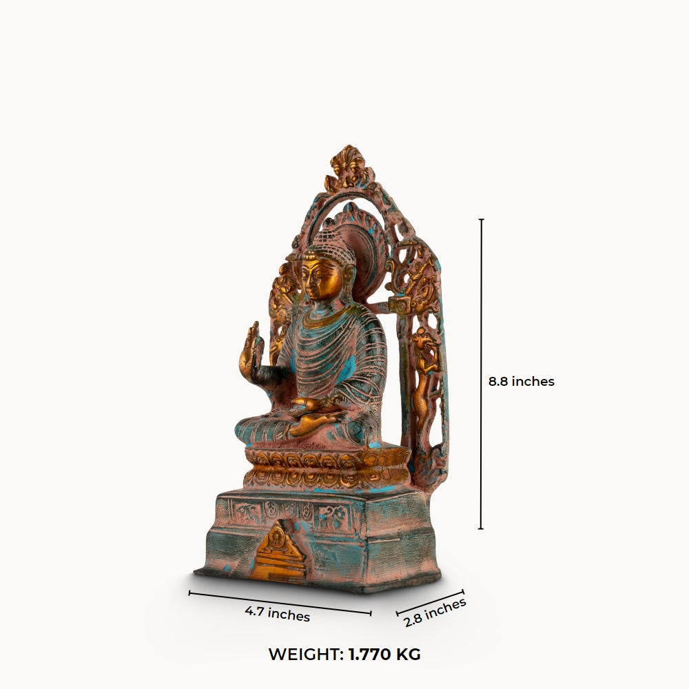 Distressed Brass Buddha Statue with Halo radiating quiet authority on a quiet study bookshelf. 