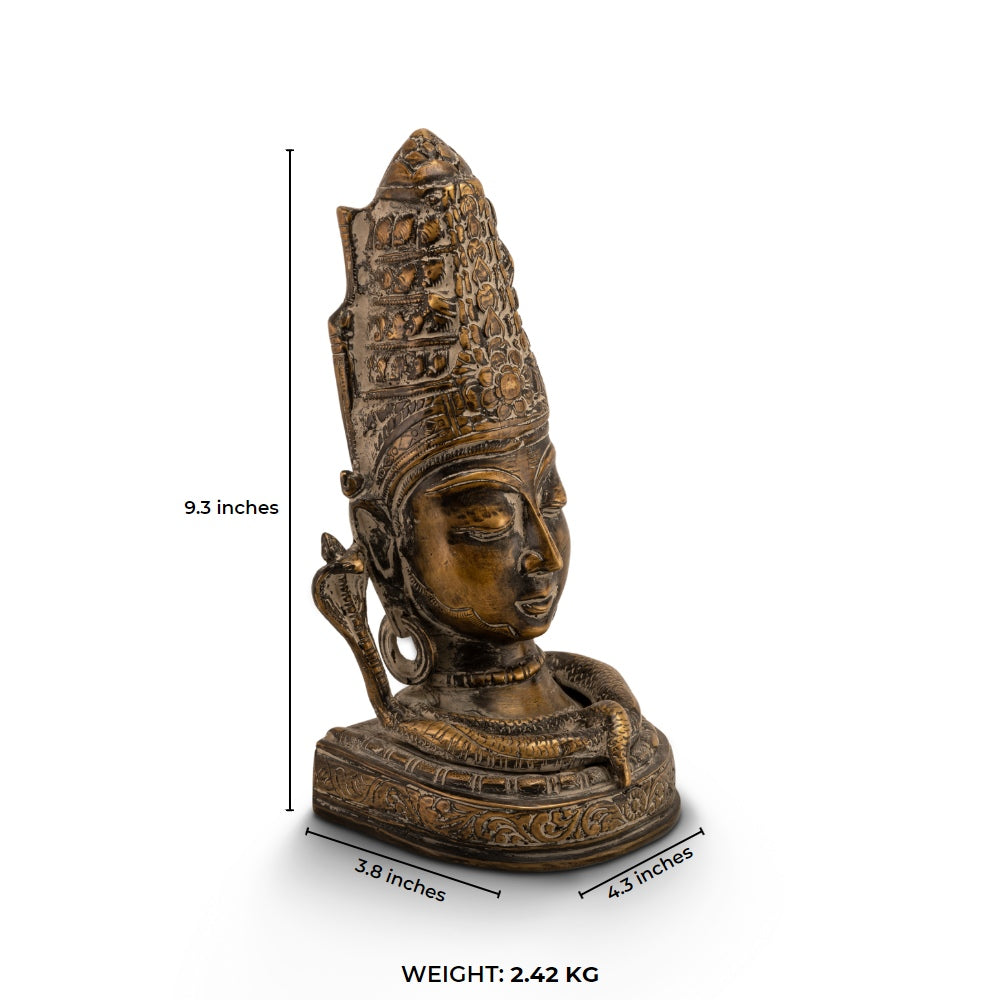 Distressed Brass Shiva Bust depicting the supreme ascetic on a meditation altar