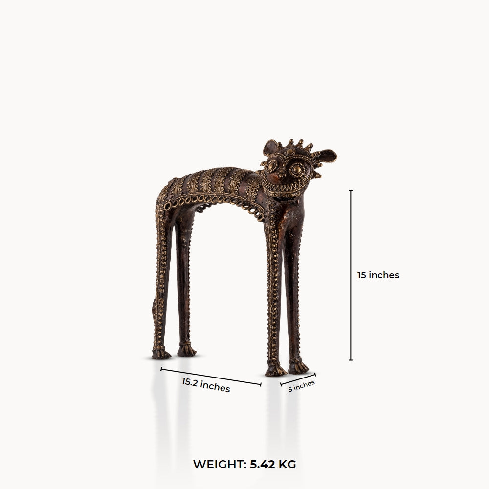 Dhokra Brass Tribal Feline Sculpture staring fiercely on a minimalist concrete credenza. 