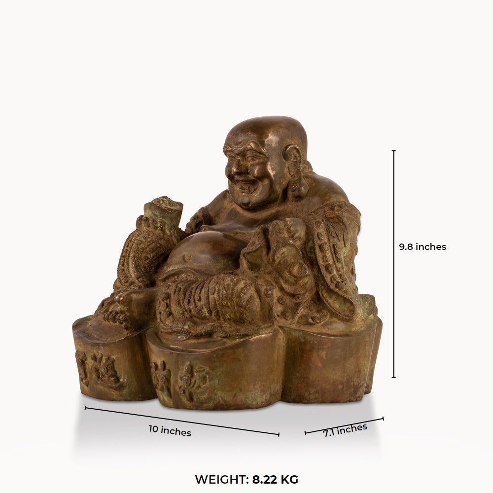 Heavy Brass Laughing Buddha Statue offering joyous abundance in a living room corner. 
