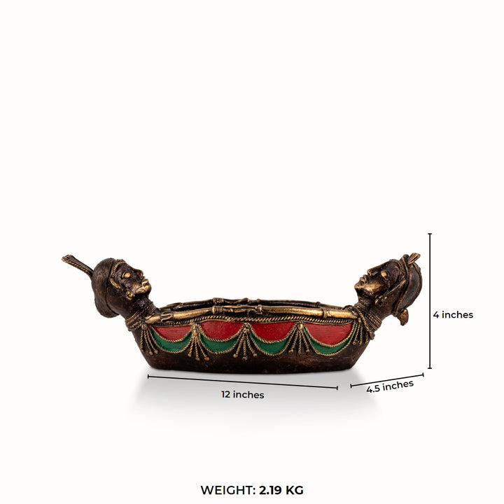 Painted Brass Boat Bowl acting as a catchall tray on a solid wood credenza. 