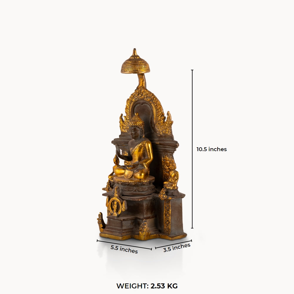 Antique Brass Buddha Shrine sheltered by a ceremonial parasol on a west-facing meditation altar. 