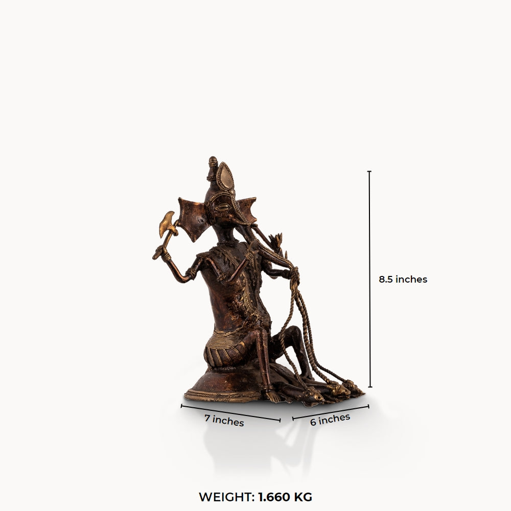 Dhokra Brass Ganesha Statue holding a tribal axe for a light-grained wooden console. 