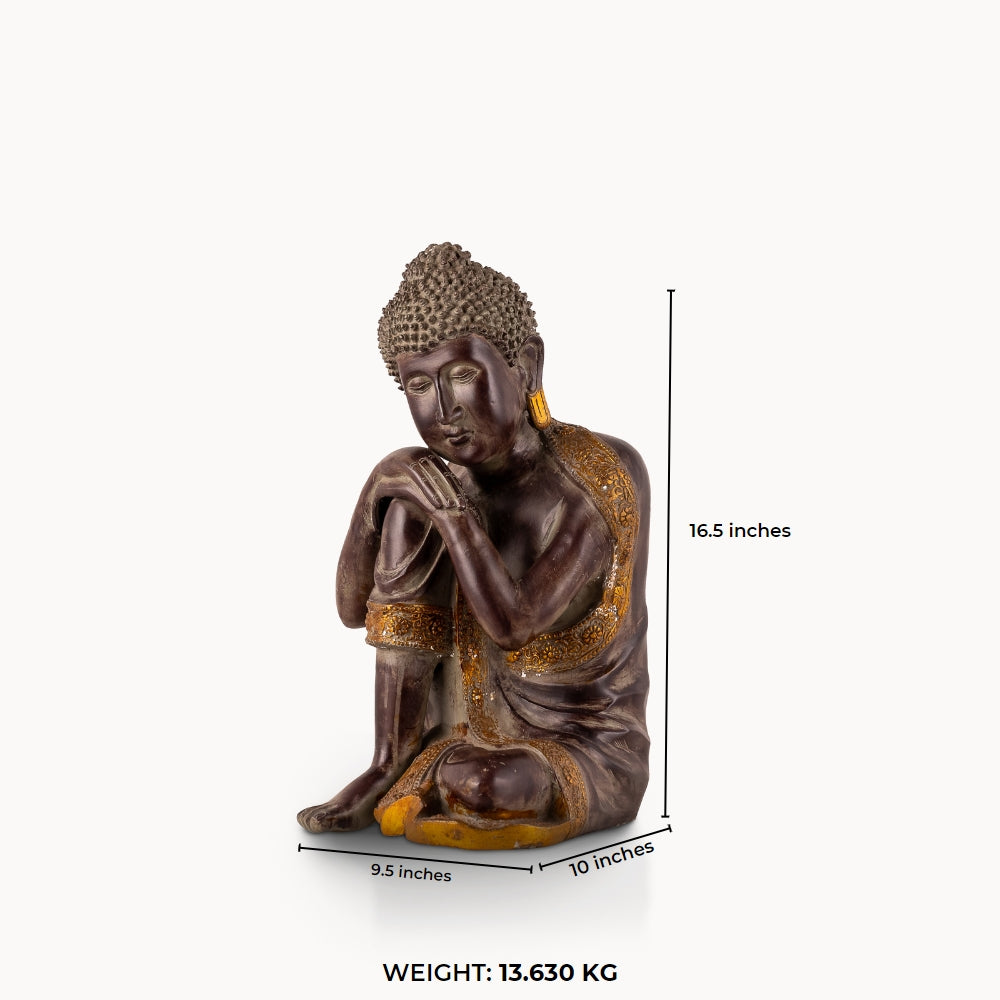 Dark Brass Resting Buddha Statue with a head on its knee for a low minimalist console.